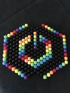 I use 6mmx8mm pony beads and elastic string to make my masks. The colors I currently use are: Red, Orange, Yellow, Green, Light Green, Royal Blue, Light Blue, Light Aqua, Pink, Purple, Maroon, Brown, Grey, Black, and White. So I can use any of these colors to customize the mask to your liking! Brand new! Hand made! Great for raves. If you have any questions or any ideas for a mask design feel free to send me a message!  Mask must be payed for within 48 hours. Contact me with any questions. Kandi Gas Mask, Rave Kandi Perler, Rave Kandi Necklace, Perler Necklace Rave, Kandi Crafts, Converse Ideas, Kidcore Fashion, Scene Clothes, Kandi Mask