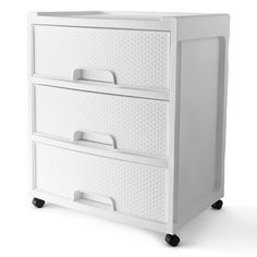 a white dresser with three drawers on wheels