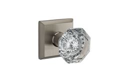 a glass door handle with a crystal knob on the front and back of it,