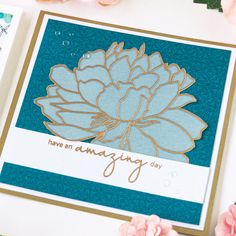 a close up of a card with flowers on it