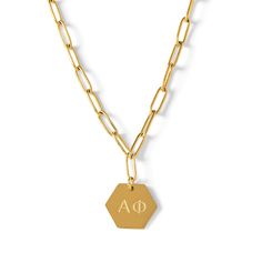 PRICES MAY VARY. UNIQUE PAPERCLIP STYLE CHAIN DESIGN – The gold-dipped Alpha Phi gifts are designed to make a statement. The 18 inch paperclip style chain, with 2" of extra for adjustment, combined with the sorority Greek letters 15mm pendant provides a unique look. 18K GOLD PLATED – Sorority Shop's stainless steel gold-plated Alpha Phi necklace is one of a kind. It gets its shine from 18 karat Champagne gold, which has been vacuum plated to create it's brilliance and strength. As a result, it w Alpha Phi Sorority, Sorority Jewelry, Sorority Events, Paperclip Necklace, Big Little Gifts, Symbol Necklace, Sorority Gifts, Alpha Phi, Greek Letters