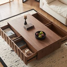 a coffee table with drawers is shown in this living room