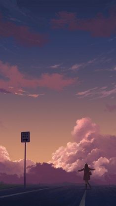 a woman walking down the road with her arms outstretched in front of clouds and a street sign