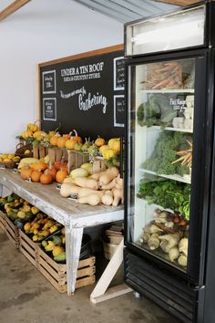 an assortment of fruits and vegetables on display