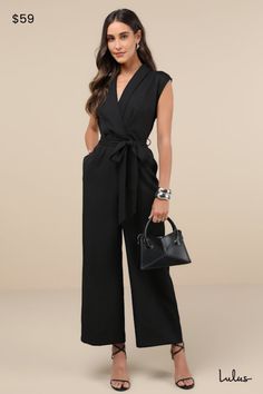 Arrive with a chic look that'll have everyone talking thanks to the Lulus Impressive Direction Black Collared Sleeveless Wide-Leg Jumpsuit! This sophisticated jumpsuit has a lightweight woven fabrication that shapes a collared neckline with long lapels, and a sleeveless, surplice bodice with pleated details. High, fitted waist boasts a tying sash belt that tops wide pant legs with side seam pockets and slightly cropped hems. Hidden back zipper/clasp. Fit: This garment fits true to size. Length: Chic Jumpsuits With Tie Waist For Night Out, Elegant Strapless Jumpsuit For Work, Chic Belted Jumpsuits And Rompers, Elegant Sleeveless Solid Color Pantsuit, Versatile Sleeveless Jumpsuits For Work, Sleeveless Summer Pantsuit For Office, Chic Black Jumpsuit With Tie Waist, Solid Strapless Jumpsuit For Work, Summer Sleeveless Office Pantsuit