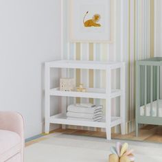 a baby's room with two cribs in it