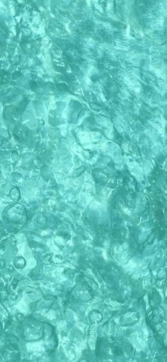 the water is very clear and blue with little ripples