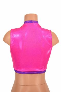 "This item is made to order, please read all the way through the listing before purchasing! This crop top is made from four way stretch spandex in uv glow pink sparkly jewel fabric Grape Holographic fabric accents around the middle opening, neckline, and hemline. It features a keyhole design in front, with a high back, and fits like a glove! TOP LENGTH: Underarm to hemline measures 8\" Womens Sizing (See below for instructions on where measurements should be taken) XXS: Bust 29\"-30\" / Waist 22 Fitted Sleeveless Disco Top, Pink Stretch Tank Top For Party, Purple Sleeveless Club Top, Pink Sleeveless Tank Top For Club, Pink Fitted Crop Top For Club, Stretch Sleeveless Rave Tops, Sleeveless Stretch Rave Tops, Pink High Stretch Sleeveless Top, Rave Sleeveless Tops For Club