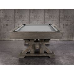 a pool table made out of wooden planks