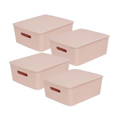 three pink storage boxes sitting next to each other