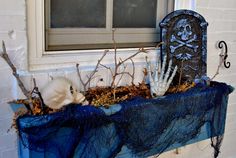 a window sill decorated with halloween decorations