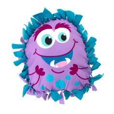 a purple and blue stuffed animal with big eyes