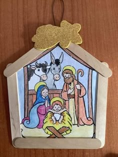 an ornament with a nativity scene on it