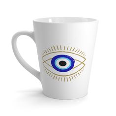 a coffee cup with an eye on it