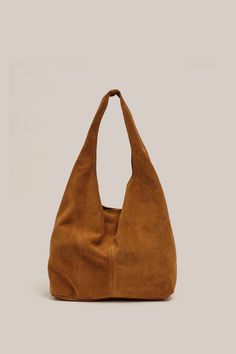 PRE - ORDER Shipping From October 16th , 2024 Crowned by ELLE magazine as the next must-have bag, the Sienna Suede Hobo Bag is a relaxed shoulder bag with a magnetic stud closure at the top. Sienna is the new perfect slouchy tote to elevate your everyday. Please see product image for most accurate colour. Our VESTIRSI Soft Leather Suede Hobo Tote Bag, Chic Brown Suede Hobo Bag, Luxury Suede Hobo Bag, Brown Suede-lined Hobo Bag For Everyday, Suede-lined Hobo Shoulder Bag For Shopping, Suede Hobo Bag, Crossbody Saddle Bag, Slouchy Tote, Slouchy Bag