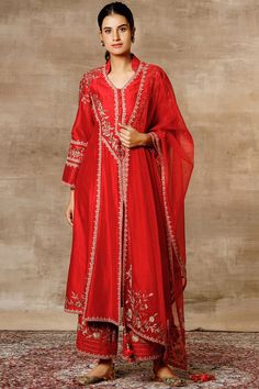 Red flared kurta with panelled floral motifs. Comes with palazzo pants and organza dupatta.
Components: 3
Fabric: Chanderi
Neckline: Mandarin collar
Sleeve Length: Full
Color: Red
Embroidered
Front slit
Embroidered dupatta with tassels
Closure: Kurta: Front buttons - Aza Fashions Asian Suits, Collar Kurti, Collar Kurta, Kurta With Palazzo, Kurta Palazzo Set, Red Kurta, Red Flare, Simple Kurti, Kurta Set For Women