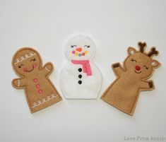 three felt snowman and reindeer appliques