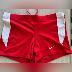 Red Nike Dry Fit Volleyball Shorts. Never Worn Fitted Red Athletic Shorts For Sports, Red Fitted Athletic Shorts For Sports, Red Bottoms For Cheerleading In Summer, Red Athleisure Swimwear For Workout, Red Shorts For Summer Sports Events, Red Sporty Workout Bottoms, Sporty Red Nike Bottoms, Red Stretch Shorts For Swimming, Red Sporty Shorts For Sports Events