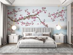 a bedroom with pink flowers painted on the wall and a bed in the foreground