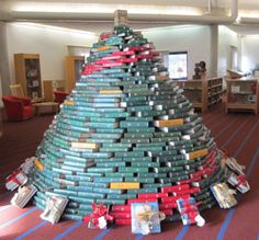 a very large christmas tree made out of boxes