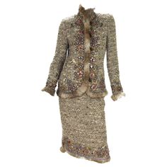 Oscar De La Renta Runway Embellished Fur Trim Skirt Suit F/W 2004 Collection Designer size - 8 85% Wool, 10% Mohair, 5% Polyester. Jacket - Exquisite hand studded, Fur trim for additional reach and cozy look, Decorative Horn Buttons, Zipper Front Closure. Measurements: Length - 26 inches, Sleeve - 25 + fur, Bust - 36 inches. Skirt - Exquisite hand studded, Fur trim for additional reach and cozy look, Fully lined, Side zip closure. Measurements: Length - 24 inches, Waist - 28.5 inches. Made in It Fur Trim Skirt, Mackenzie Hollister, Luxury Fashion Outfits, 2004 Runway, Suits Outfits, Suit Brown, Classic Chanel, Vintage Runway, Embellished Skirt