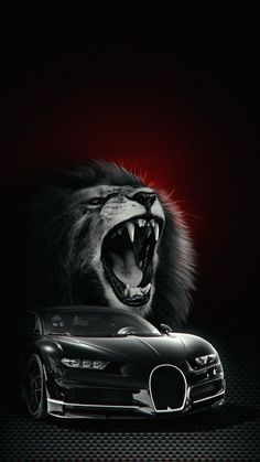 a car with its mouth open in front of a lion's head and red light behind it