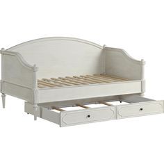 a white bed with drawers underneath it and an open drawer under the bed headboard