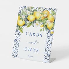 a card with lemons and flowers on it