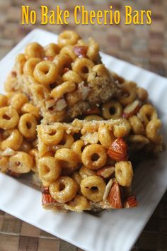 no bake cheesy bars on a plate with the words, no bake cheerio bars