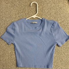 Blue Ribbed Cropped Baby T From Zara Never Worn! Brand New Condition! Size M! Fitted Blue Ribbed T-shirt, Trendy Blue Ribbed T-shirt, Casual Purple Ribbed Top, Light Blue Ribbed Stretch Top, Light Blue Stretch Ribbed Top, Stretch Ribbed Light Blue Top, Basic Blue Ribbed T-shirt, Blue Fitted Ribbed T-shirt, Blue Ribbed Cotton Crop Top