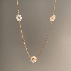 - This cute flower necklace is made of 18K GOLD PLATED stainless steel chain , and 3 flower charms.  - Super simple and cute, goes well with all your outfits! - length:  14.5 inches +2 inches of extender chain.  -Shipping: All orders will be shipped out within 1-2 business days after the order has been received. Ship from New York, United States. USPS first class mail on this order. 🚗 - Thank you for visiting my listing. - For more beautiful neacklaces like this: https://www.etsy.com/shop/Funbeadsbygrace1?ref=dashboard-header&section_id=50341900 -  Follow us on Instagram: funbeadsbygrace for more beautiful creations and updates on the shop! Dainty Jewelry With 3d Flower Details, Dainty Flower Shaped Jewelry With 3d Flowers, Dainty 3d Flower Jewelry, Gold 3d Flower Jewelry For Gift, Gold 3d Flower Jewelry Gift, Dainty Gold Jewelry With 3d Flowers, 14k Gold Filled Flower Jewelry, Dainty Gold-plated Flower Pendant Necklace, Dainty Gold-plated Flower Necklace