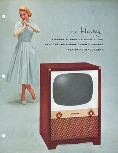 an advertisement for the television, with a woman standing next to it and holding her hand up to her face