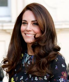 a close up of a person with long hair