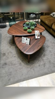 a coffee table sitting on top of a carpeted floor