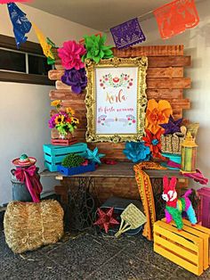 a colorful display with flowers and decorations on it