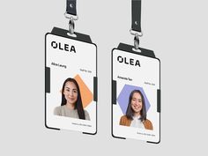 two id cards with the name and image of two women in black, white and orange