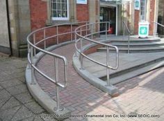 the stairs lead up to an entrance into a building