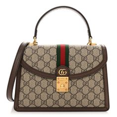 This is an authentic GUCCI GG Supreme Monogram Textured Dollar Calfskin Web Small Ophidia Padlock Top Handle Bag in Beige, Ebony and New Acero. This crossbody bag is crafted of GG supreme monogram coated canvas, with brown leather trim. The bag features an adjustable brown leather shoulder strap with gold hardware, a red and green web stripe detail down the center, and a matching gold Gucci GG logo on the crossover flap. The bag opens to a partitioned beige microfiber interior with zipper and patch pockets. Green Web, Gg Logo, Handle Bag, Leather Trim, Leather Trims, Gold Hardware, Crossover, Patch Pocket, Top Handle