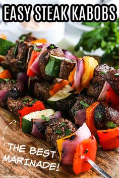 steak kabobs on a cutting board with the title easy steak kabobs