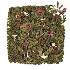 a pile of green tea with pink and white flowers