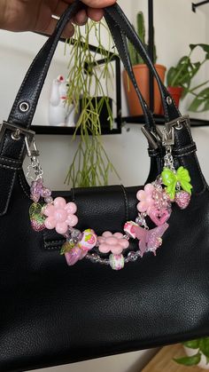 You don't need a new bag, you just need to charm! I created these chains to freshen up your old and new accessories, to personalize them and make them more unique to you!  Chain Length approx: shorter strap 11" , longer strap hangs 12"  + 6 handmade charms Colors: pink, green, white, silver  Materials, Metal, handcrafted beads, ceramic beads, plastic beads Collection: Strawberry Dew  Bag chains are not meant to hold weight but to decorate your accessories Personalized Bags Ideas, Bags With Keychain, Cute Bag Keychains, Decorated Bags Aesthetic, Decorate Bag Ideas, Purse With Charms, Purse Accessories Ideas