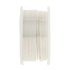 a spool of white electrical wire on a white background