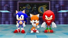 sonic the hedgehog and tails are standing next to each other