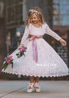 ALL FLOWER GIRL DRESSES 10% OFF - USE CODE: FLOWERGIRL10 😍 FREE SHIPPING ON ALL ORDERS $100 UP Just imagine the perfect fairytale flower girl dress! Our lovely champagne lace rustic boho flower girl dress is an excellent choice for your fairytale wedding, traditional or bohemian wedding themes. Dress features all over champagne color French lace with feathered fringe v-back and a lovely, scalloped lace detail at hem. Beautiful choice for your toddler to teen flower girls, beautifully elegant an Feathered Fringe, Boho Flower Girl Dress, Dance Portraits, Bohemian Wedding Theme, Vintage Flower Girls, Flower Girl Dresses Vintage, Lace Flower Girl Dress, Boho Flower Girl, Hannah Rose