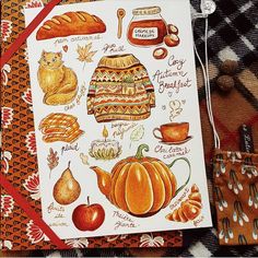 a card with an illustration of autumn items on it