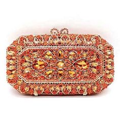 This Gorgeous Metal Clutch Is Beautifully Decorated By Our Talented Artisans With Hundreds Of Hand Set Orange Sparkling Austrian Crystals. An Elegant Evening Bag For A Wedding, Night Out On The Town Or Any Formal Event. Removable Chain Strap. Magnetic Closure. Metallic Faux Leather Lining. Accommodates All Iphone Models Or Similar Size Phones With Maximum Dimensions Of 160 Mm X 78 Mm. Approx. 8.25" L X 4.75" H X 2.5" W. Color For Sale In This Listing Is Orange. Video Shows The Purse In Champagne Elegant Orange Bag Gift, Elegant Orange Rectangular Evening Bag, Elegant Orange Clutch As A Gift, Orange Rectangular Evening Bag, Orange Rectangular Evening Bags, Orange Rectangular Formal Clutch, Orange Rectangular Clutch For Formal Occasions, Elegant Orange Rectangular Clutch, Elegant Orange Bag