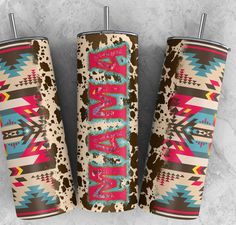 three personalized tumblers with colorful designs on them