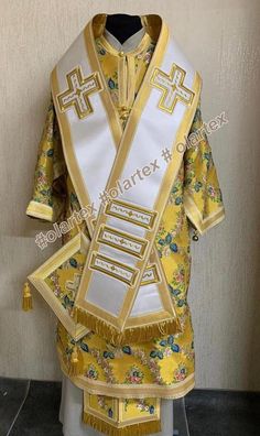 Complete Bishop Set Vestments Metallic brocade high-quality Covers set can be includes  Please, request us about availability of the fabrics.  THE VESTMENT INCLUDES: - Epitrachelion/Stole - Cuffs - Belt - Robe/Sackos - Omophorions - Palitsa/Epigonation YOU GET - Absolutely Personalized Vestment - Processing time is 7-30 business days - No shipping costs, all vestments ships free by Express Delivery - Metallic Galloon, fringe & furniture - Embroidered metallic threads crosses  - Liturgical Metallic Brocade - Linings - The special offer: altar chalice veils, and aer for $78 Please feel free to contact us if you have any questions. Fringe Furniture, Ecclesiastical Vestments, Belted Robe, Metallic Thread, Full Set, Bathing Beauties, Purses And Bags, Music Clothes, Floral