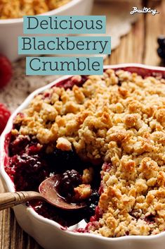 a close up of a pie in a pan on a table with berries and crumbs