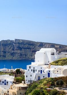 white houses on the cliff by the sea - stock photo - images and photoshops